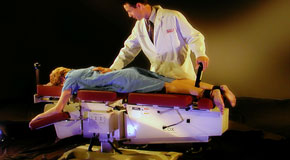 This is a picture of Cox Technic chiropratic spinal manipulation as performed at Moriarty Chiropractic.